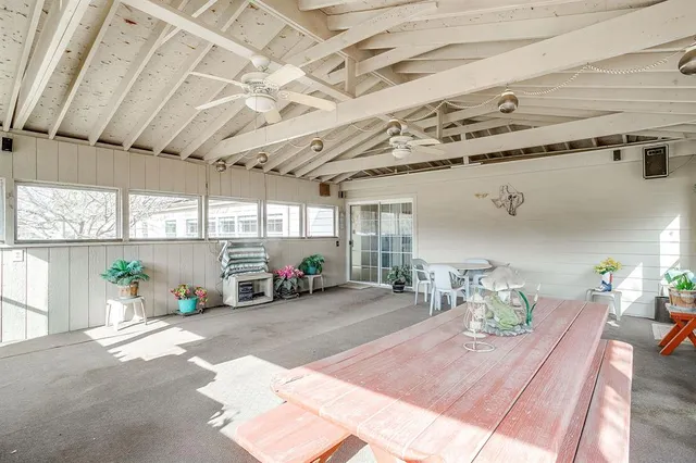 a room with lots of furniture and clutter