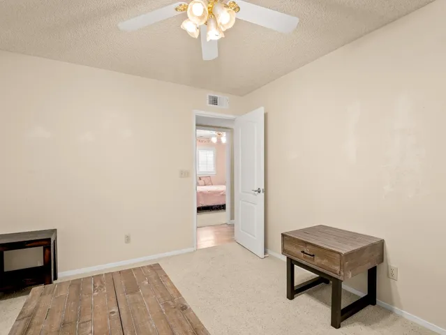 a view of a room with a workspace