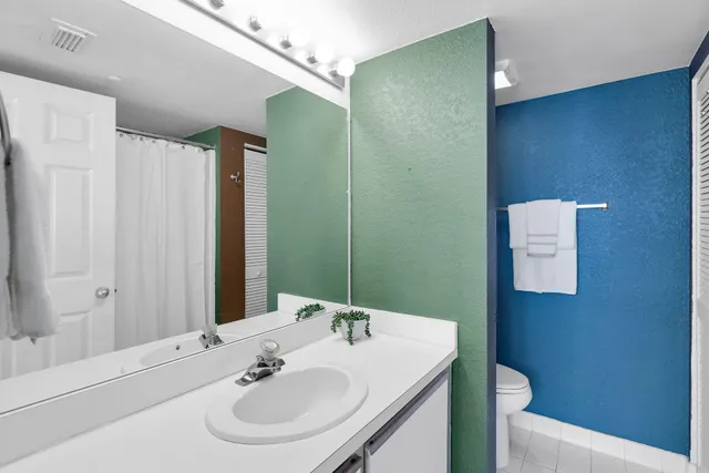 a view of a city with tall buildings