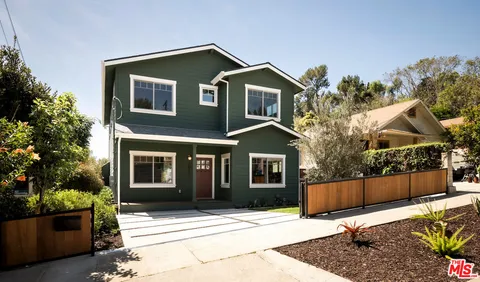 a front view of a house with windows