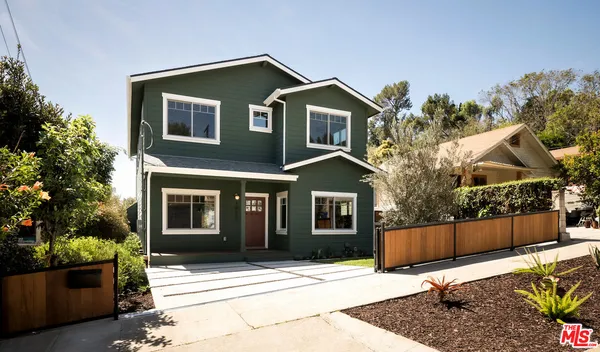 a front view of a house with windows