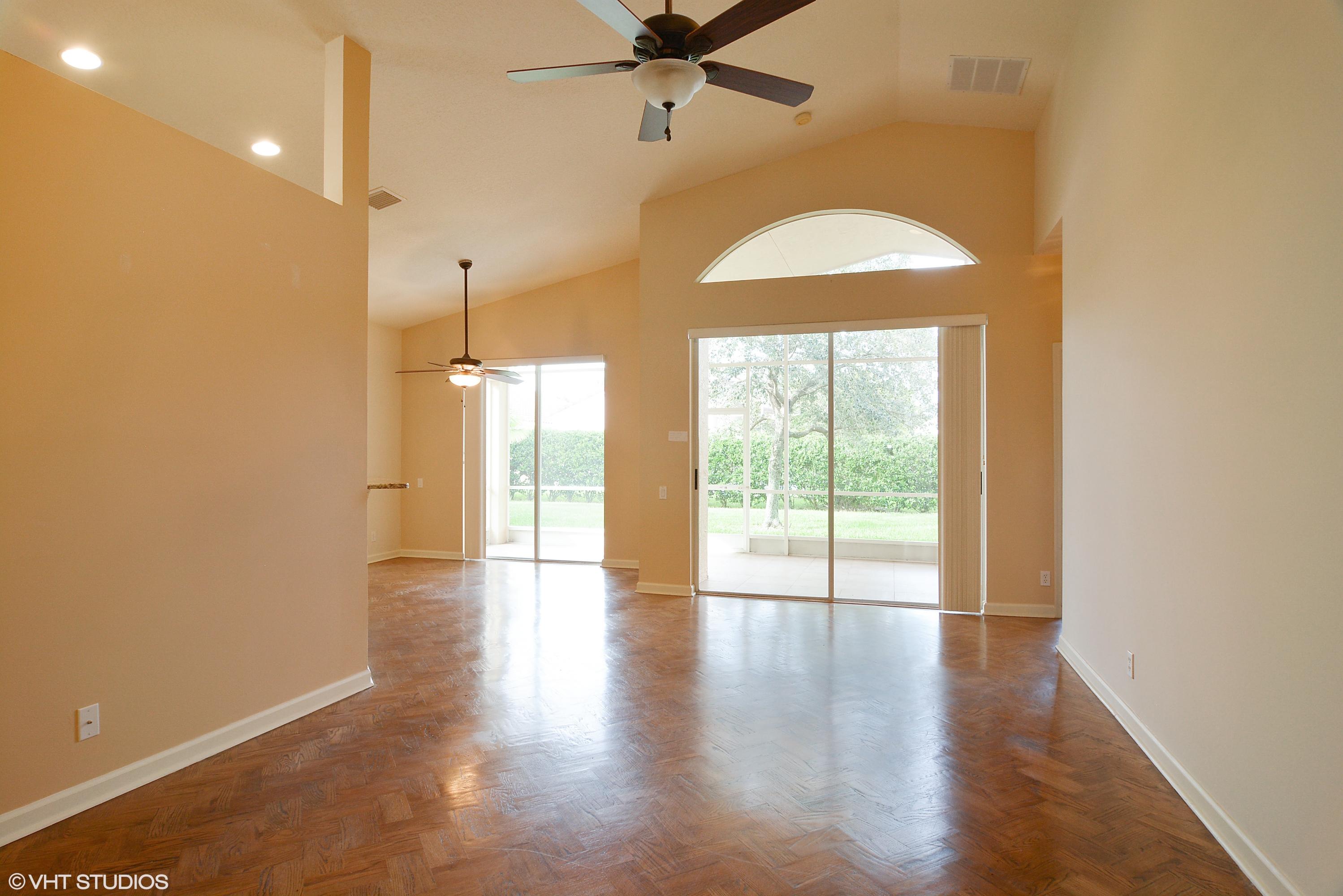381 Springview Loop Port St. Lucie, FL 34986 - Photo 2 of 10 02_381nwSpringviewLoop_93_LivingRoomDini