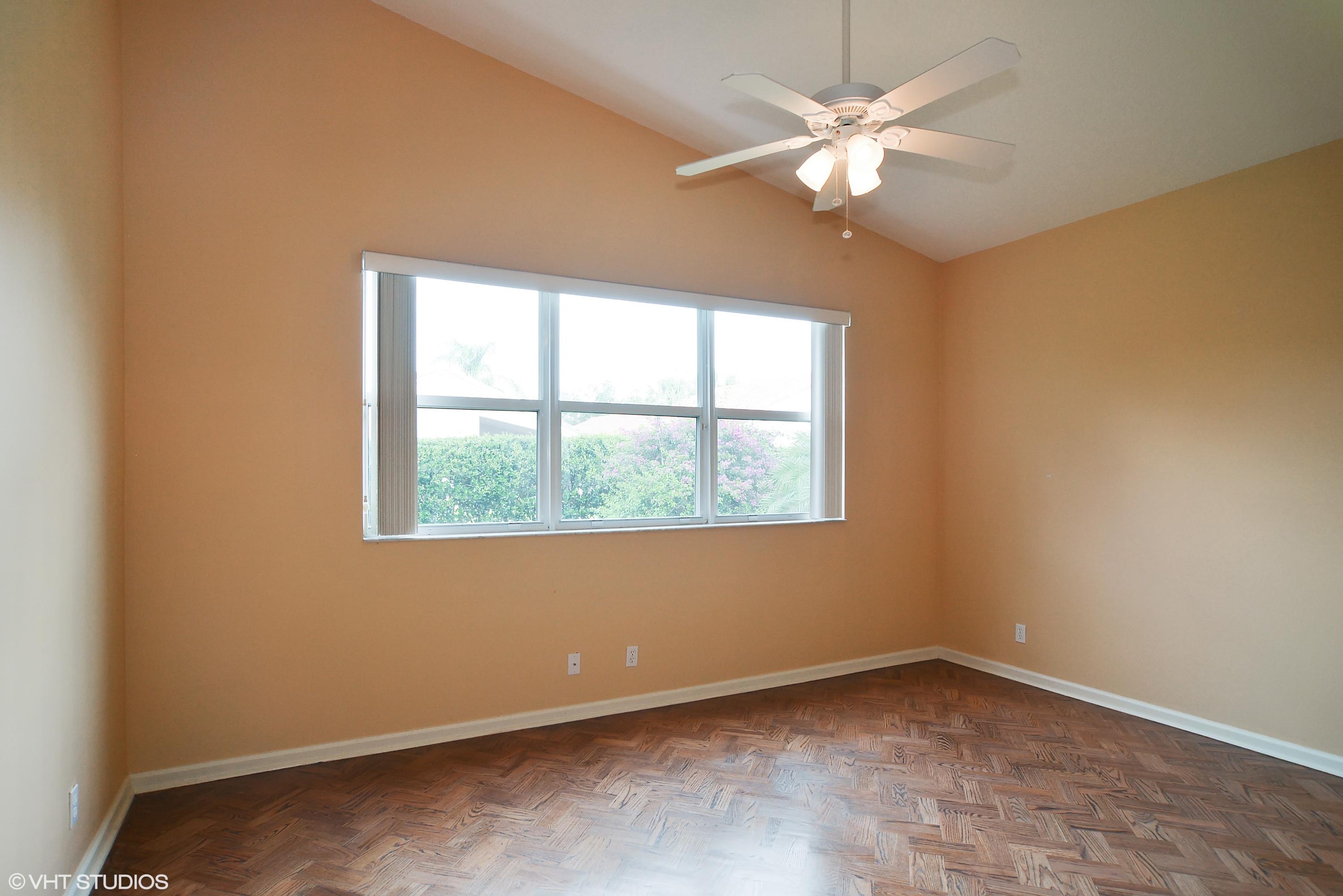 381 Springview Loop Port St. Lucie, FL 34986 - Photo 6 of 10 06_381nwSpringviewLoop_14_MasterBedroom_