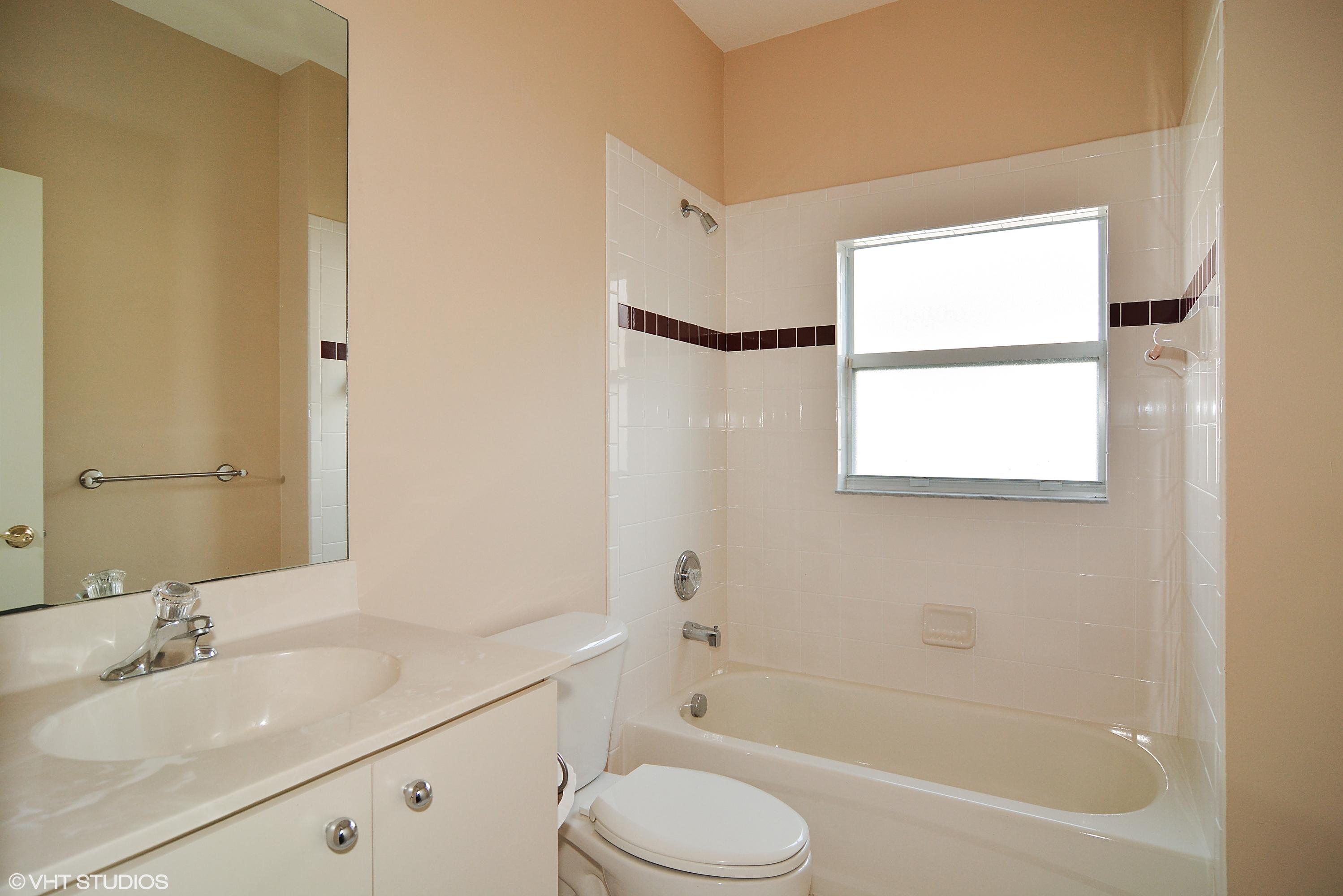 381 Springview Loop Port St. Lucie, FL 34986 - Photo 8 of 10 08_381nwSpringviewLoop_8_Bathroom_HiRes