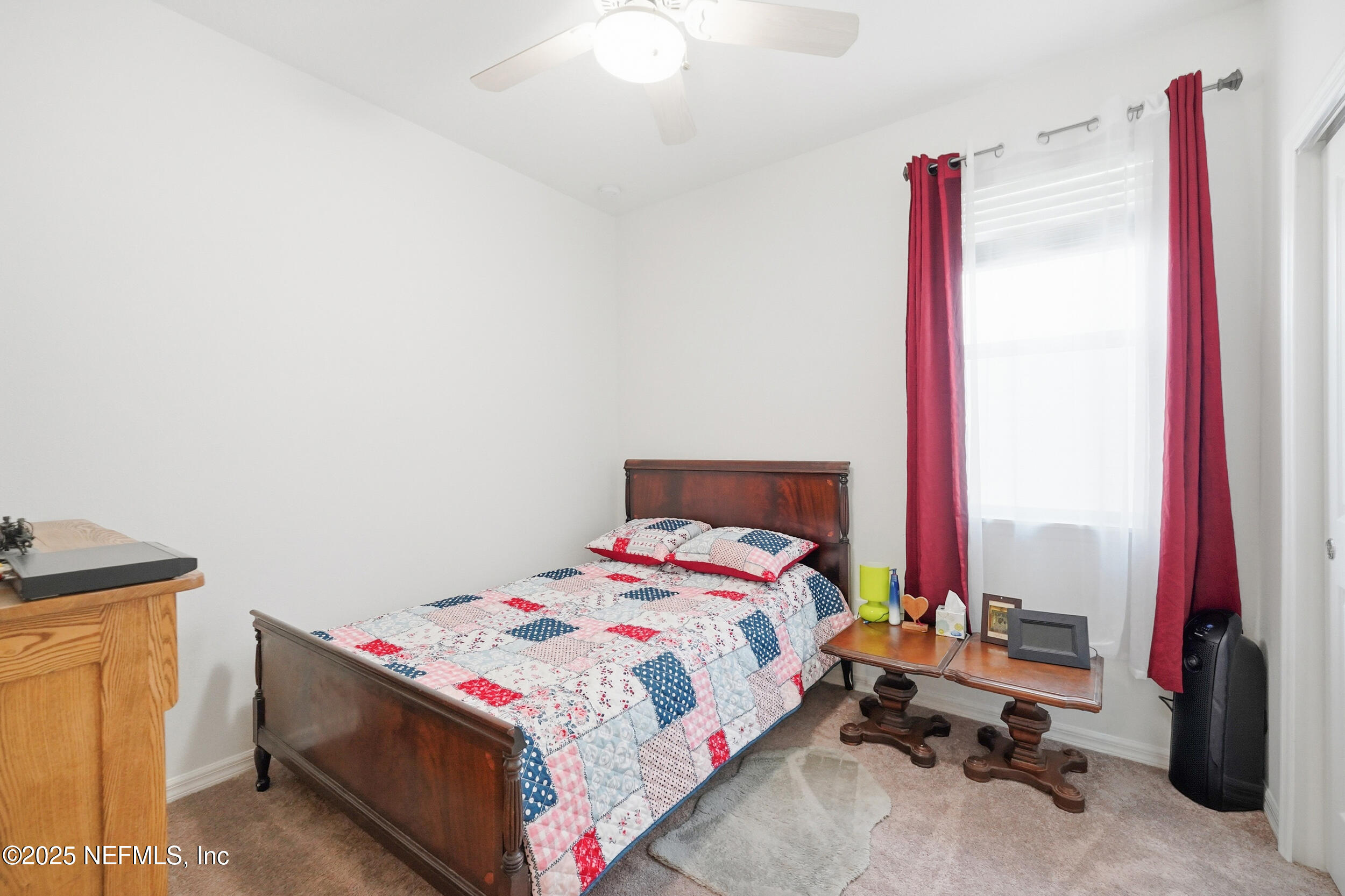 607 Blind Oak Circle St. Augustine, FL 32095 - Photo 15 of 39 a bedroom with a bed and a desk