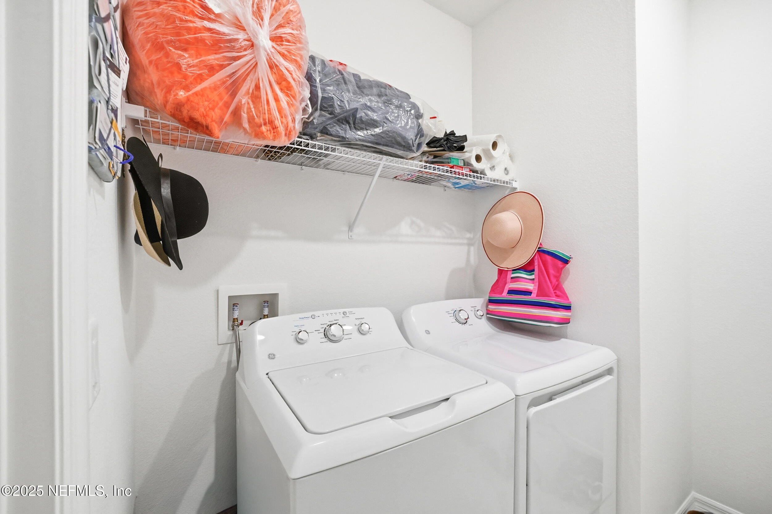 607 Blind Oak Circle St. Augustine, FL 32095 - Photo 19 of 39 a utility room with dryer and washer