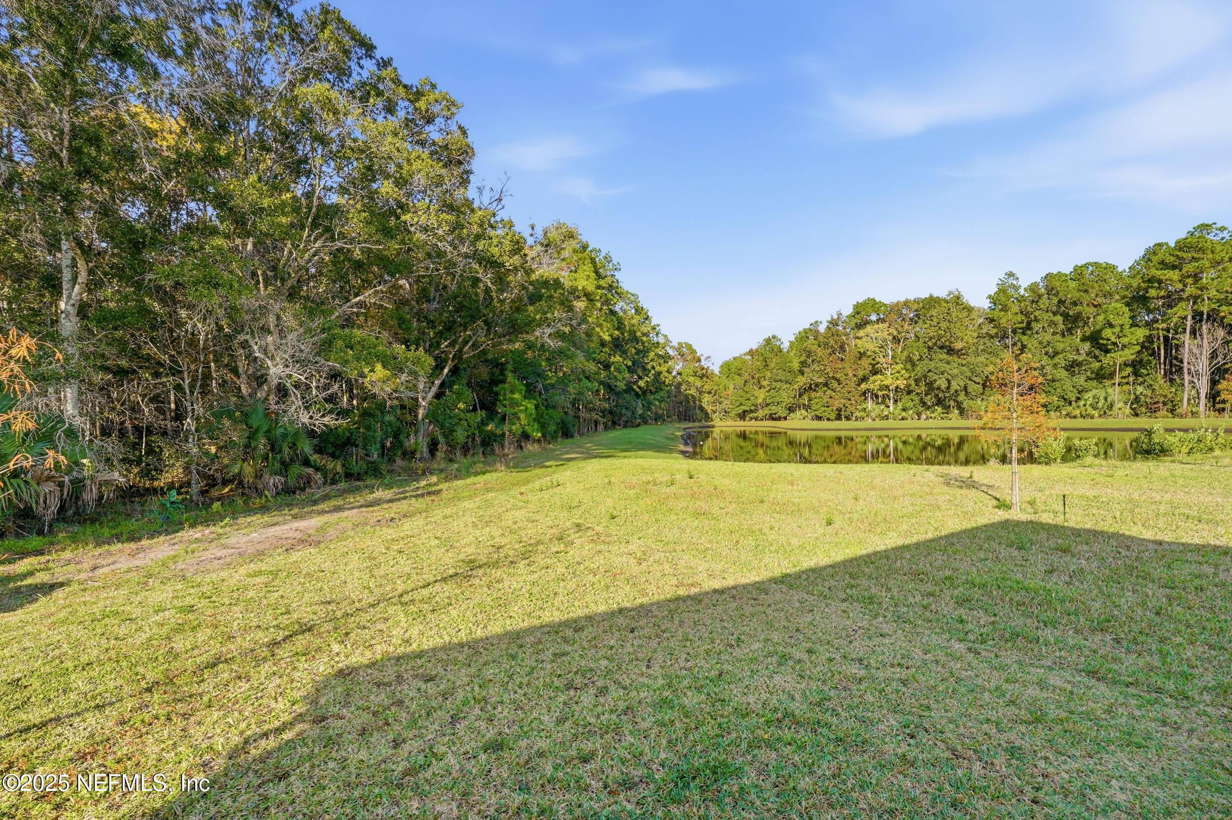 607 Blind Oak Circle St. Augustine, FL 32095 - Photo 22 of 39 a view of a yard with an outdoor space