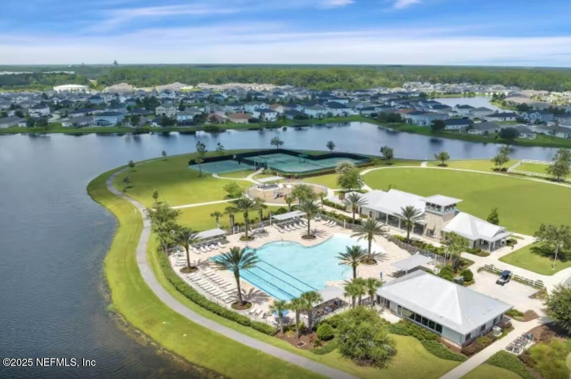 607 Blind Oak Circle St. Augustine, FL 32095 - Photo 27 of 39 an aerial view of a house with a swimming pool outdoor seating and yard