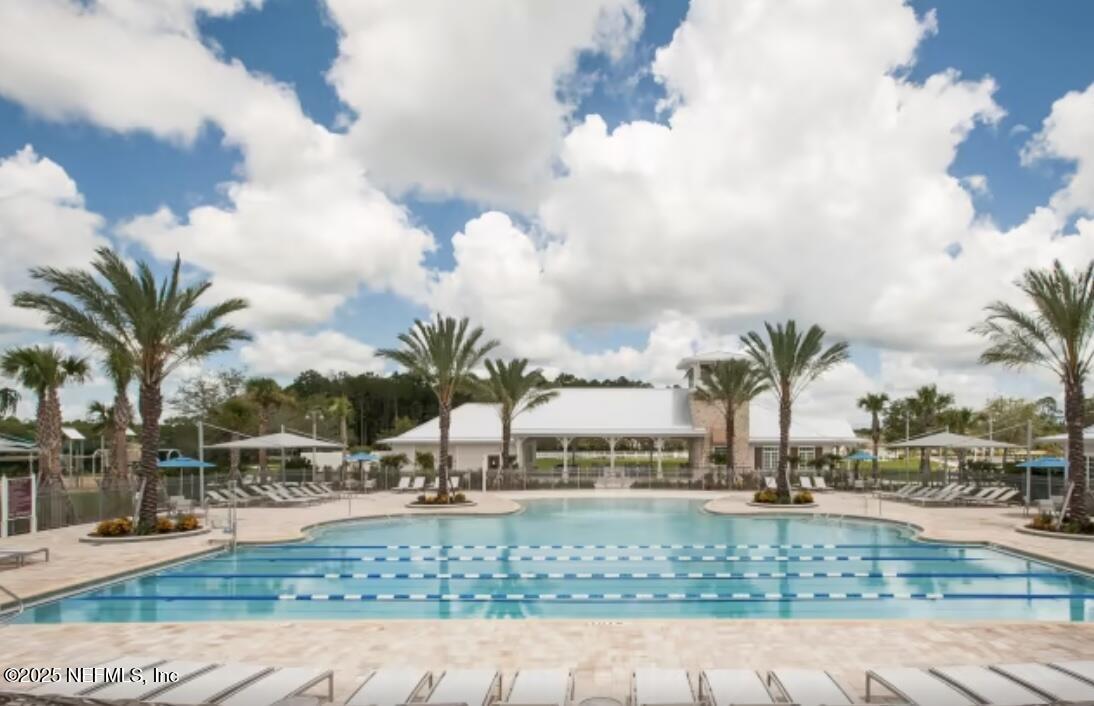 607 Blind Oak Circle St. Augustine, FL 32095 - Photo 29 of 39 a view of a swimming pool and an outdoor seating