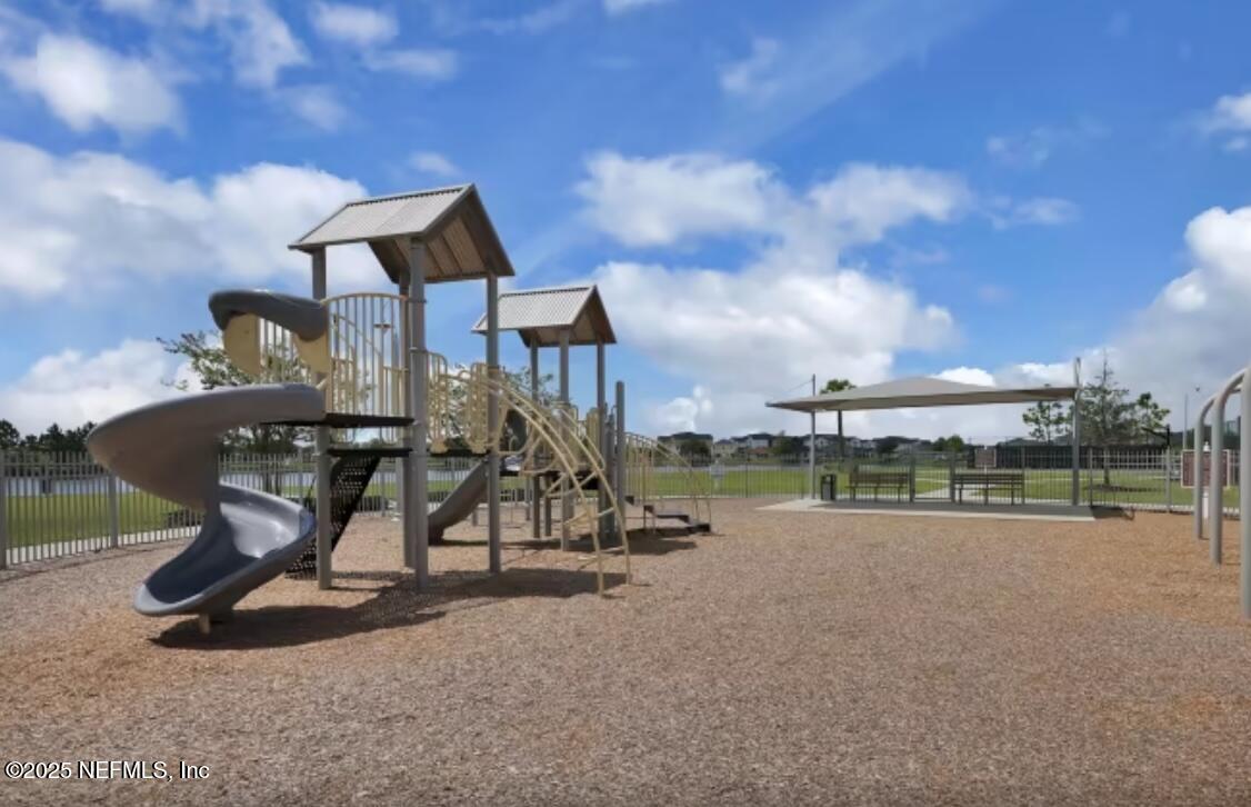 607 Blind Oak Circle St. Augustine, FL 32095 - Photo 32 of 39 a park view with a bench