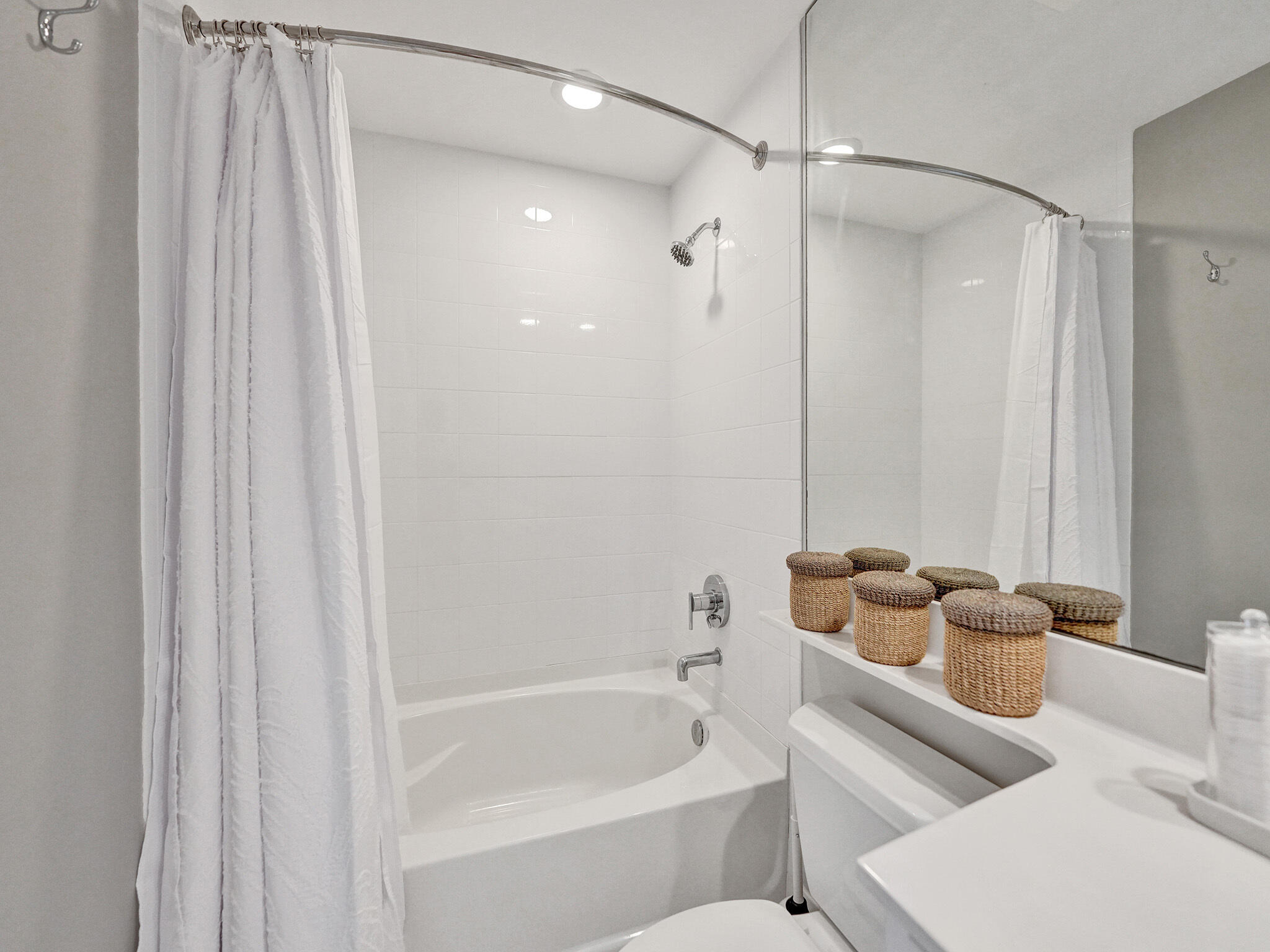 225 Northeast 1st Street, Unit 412 Delray Beach, FL 33444 - Photo 26 of 49 a bathroom with a bathtub and shower