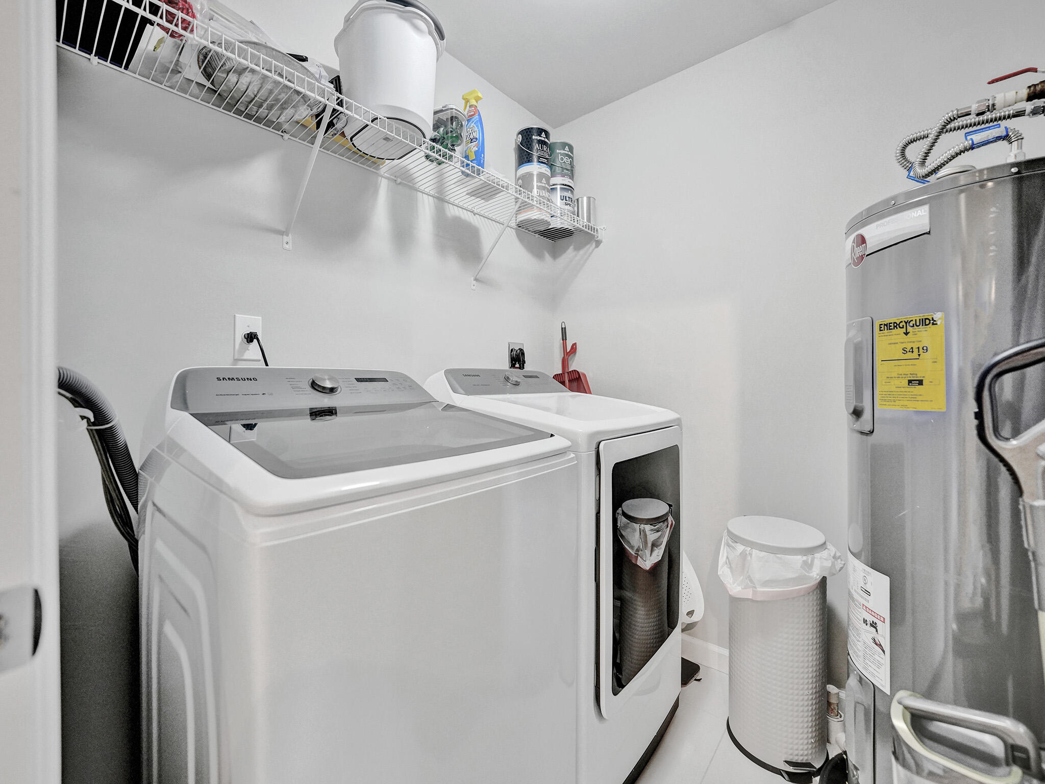 225 Northeast 1st Street, Unit 412 Delray Beach, FL 33444 - Photo 37 of 49 a utility room with dryer and washer