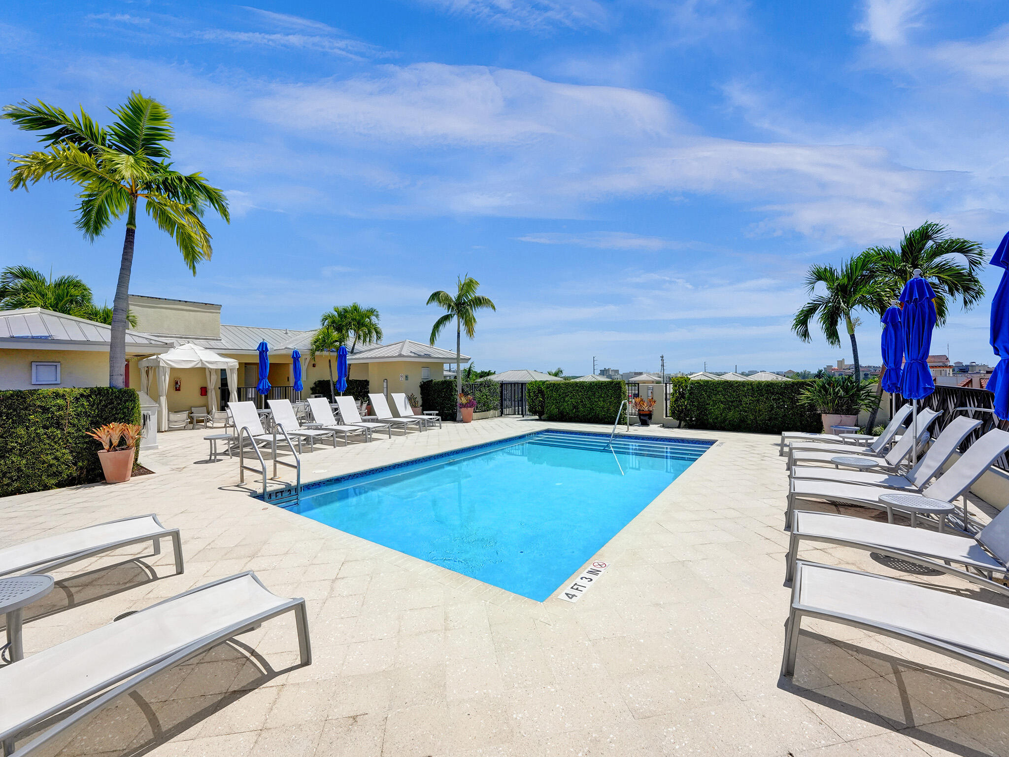 225 Northeast 1st Street, Unit 412 Delray Beach, FL 33444 - Photo 41 of 49 a view of swimming pool with outdoor seating and plants