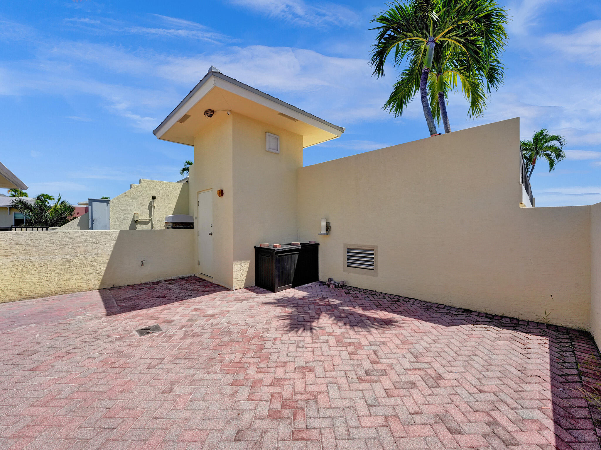 225 Northeast 1st Street, Unit 412 Delray Beach, FL 33444 - Photo 43 of 49 a view of a house with a patio