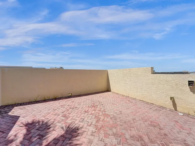 a view of a backyard of a house