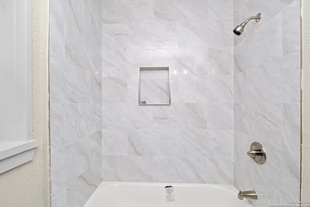 a bathroom with a bathtub