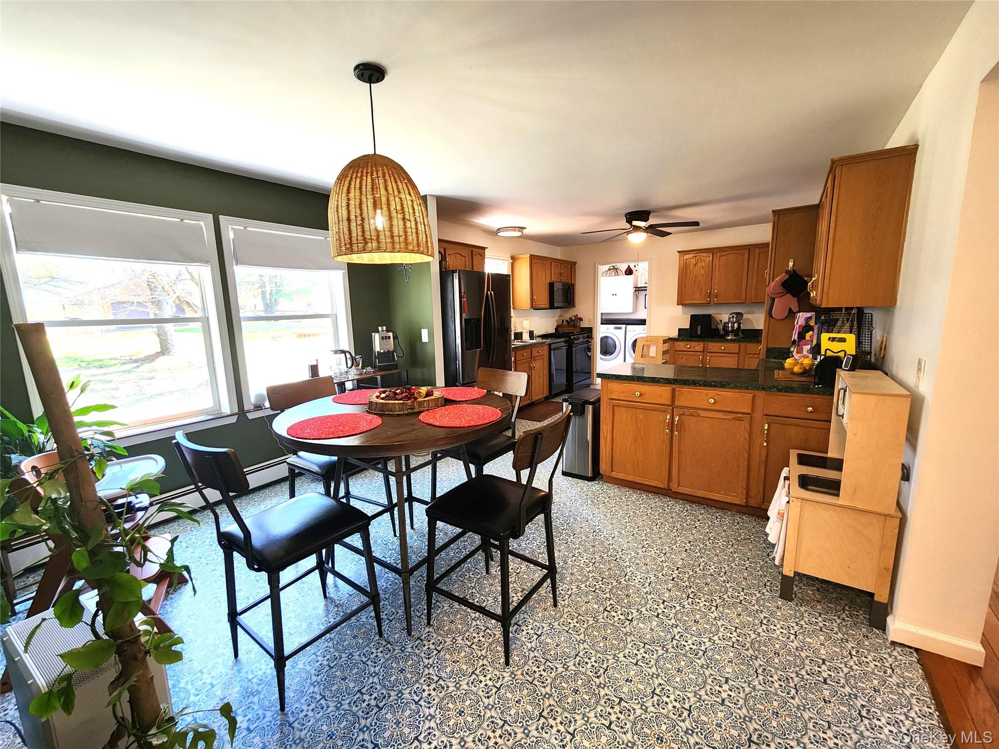 142 Old Tacy Road Bethel, NY 12783 - Photo 12 of 38 a view of a dining room with furniture window and outside view