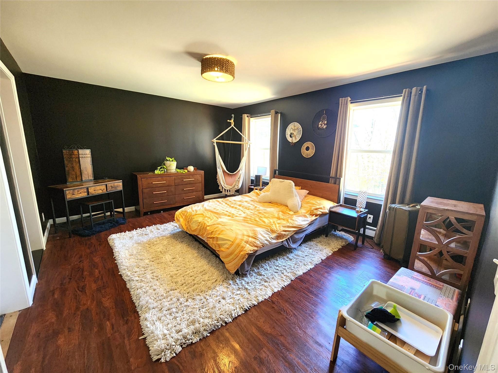 142 Old Tacy Road Bethel, NY 12783 - Photo 14 of 38 a bedroom with a bed window and couch