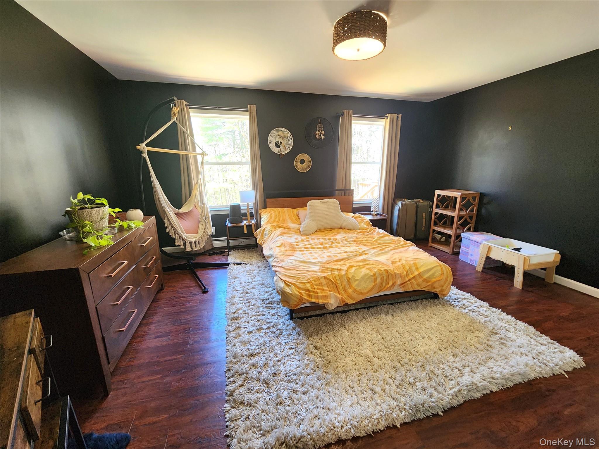 142 Old Tacy Road Bethel, NY 12783 - Photo 15 of 38 a bedroom with a bed window and a couch