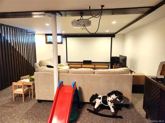 a room with furniture and a large window