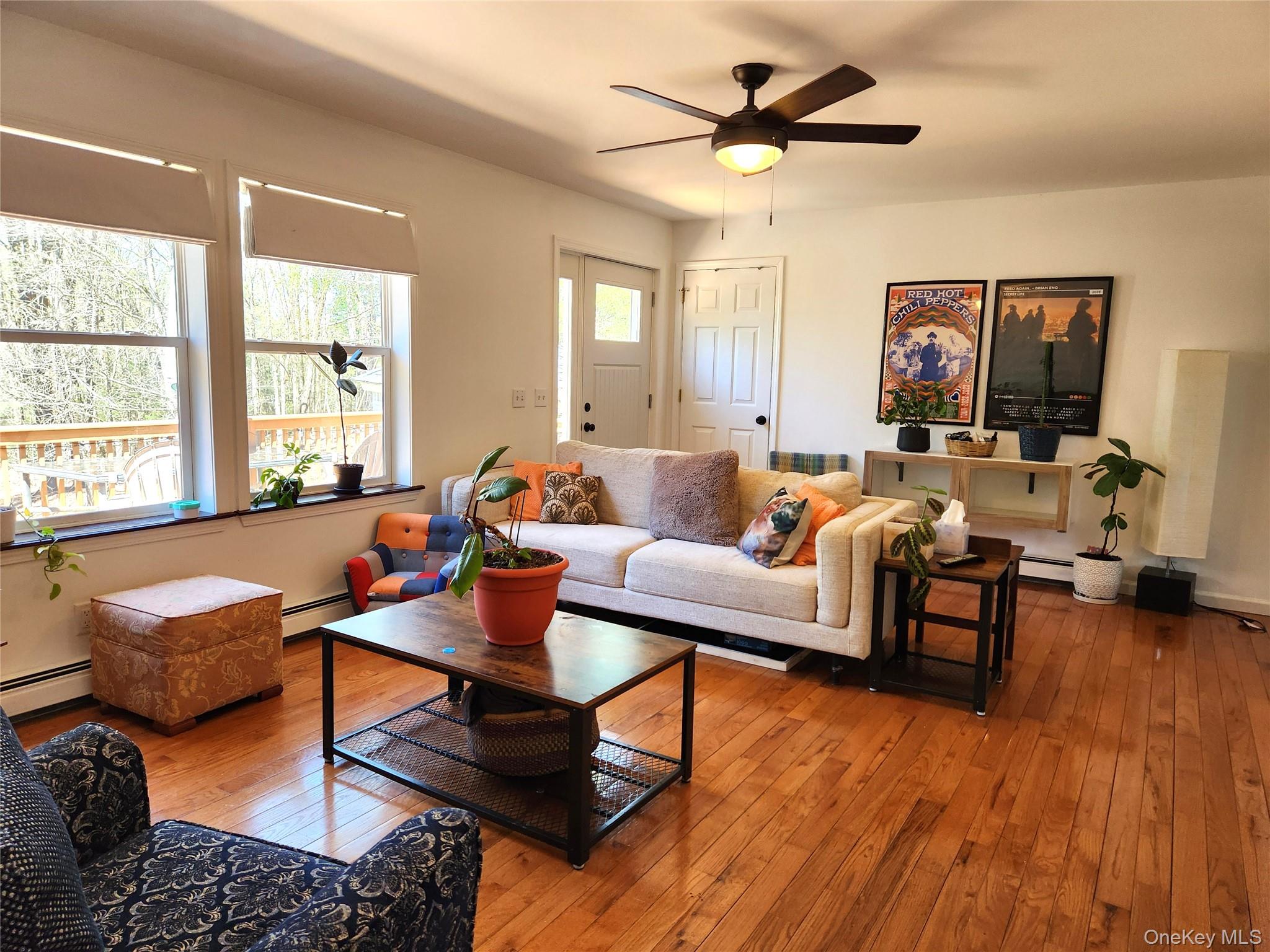 142 Old Tacy Road Bethel, NY 12783 - Photo 8 of 38 a living room with furniture and wooden floor