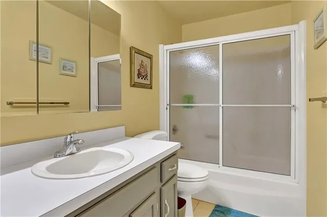 a bathroom with a sink and mirror