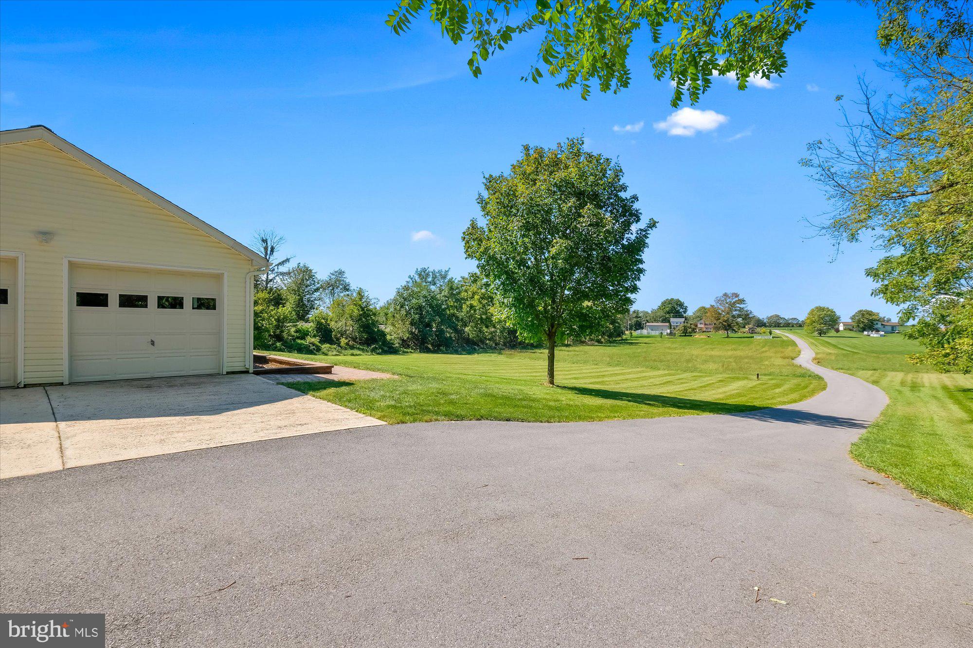 12039 Itnyre Road Smithsburg, MD 21783 - Photo 3 of 35 Completely Paved driveway and parking areas