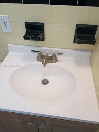 a bathroom with a toilet and a sink