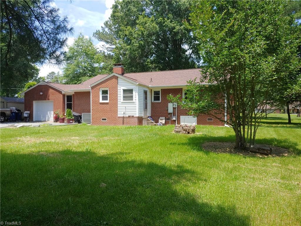 121 Cardinal Road Madison, NC 27025 - Photo 3 of 18 Left rear of home