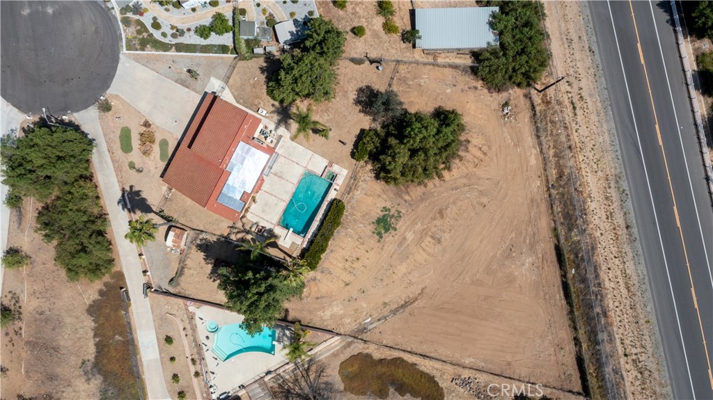 17656 Mockingbird Hill Circle Riverside, CA 92504 - Photo 41 of 49 an aerial view of a house with a yard