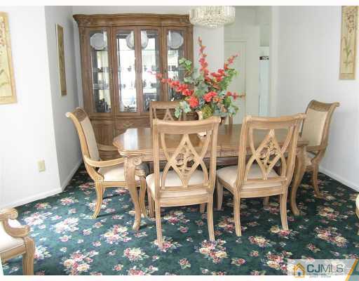 40 Timber Ridge Road North Brunswick, NJ 08902 - Photo 2 of 8 a view of a dining room with furniture and a window