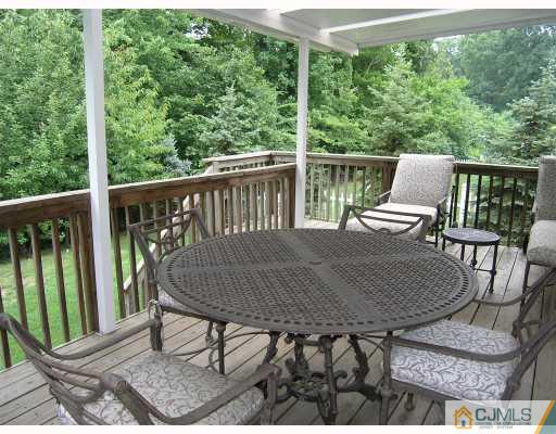 40 Timber Ridge Road North Brunswick, NJ 08902 - Photo 8 of 8 a view of a chairs and table in the balcony