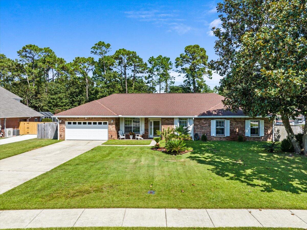 306 Tala Way Niceville, FL 32578 - Photo 1 of 47 front view of house with a yard