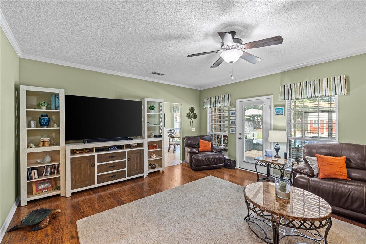 306 Tala Way Niceville, FL 32578 - Photo 17 of 47 a living room with furniture and a flat screen tv