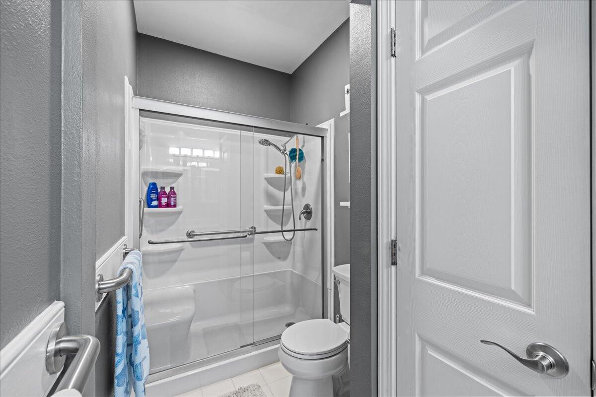 306 Tala Way Niceville, FL 32578 - Photo 27 of 47 a bathroom with a shower and a toilet