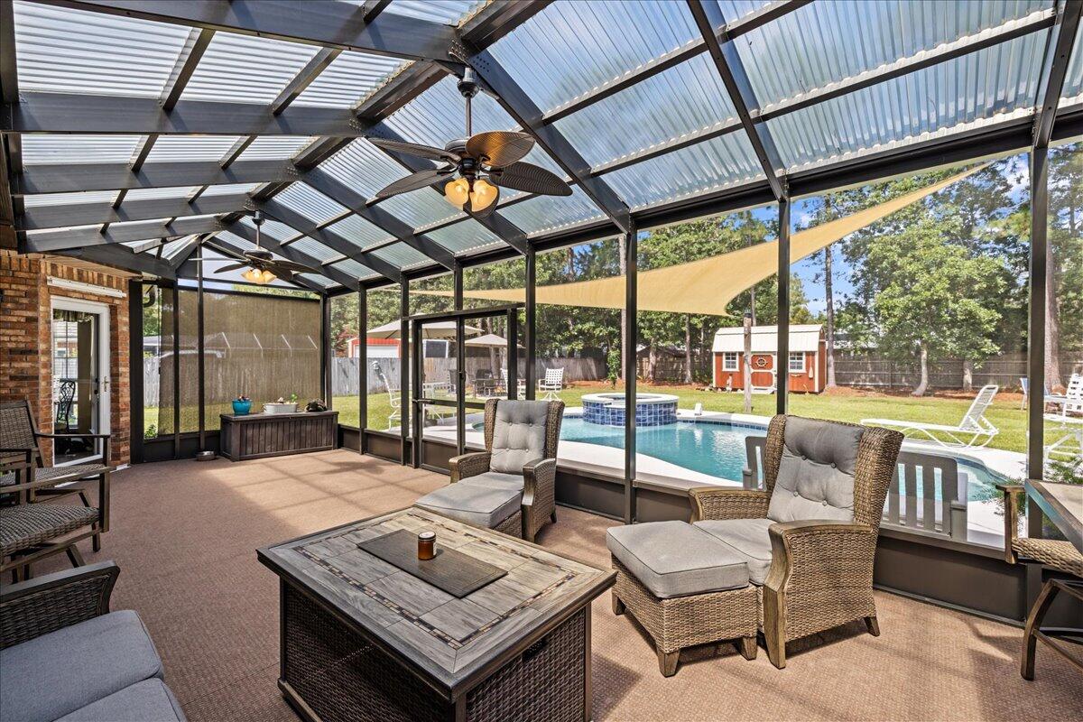 306 Tala Way Niceville, FL 32578 - Photo 30 of 47 a living room with furniture and a large window