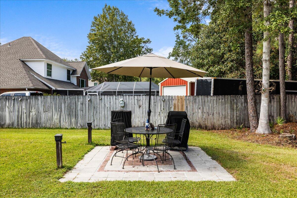 306 Tala Way Niceville, FL 32578 - Photo 37 of 47 a view of backyard with swimming pool and furniture