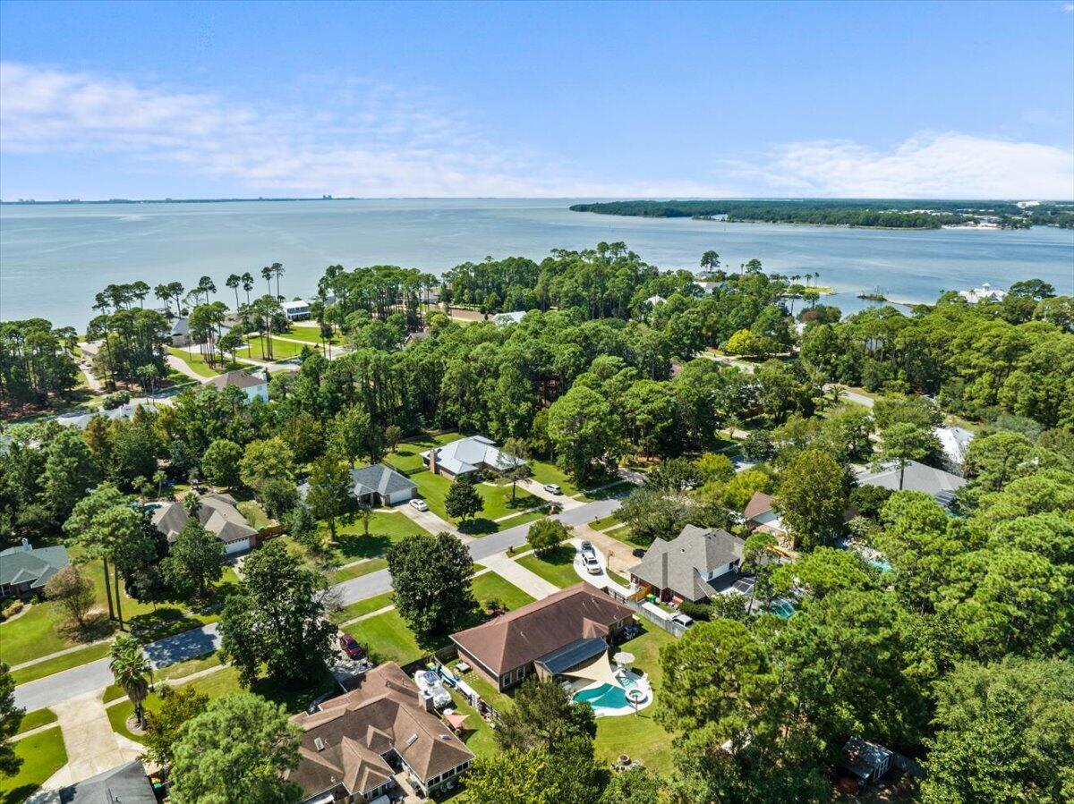 306 Tala Way Niceville, FL 32578 - Photo 43 of 47 a view of a lake with a city