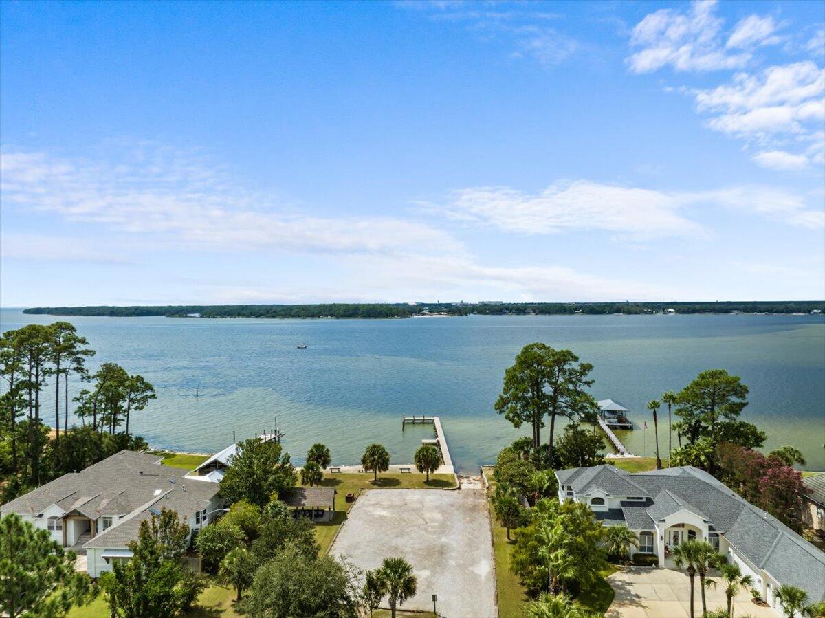 306 Tala Way Niceville, FL 32578 - Photo 46 of 47 a view of a lake with a city view
