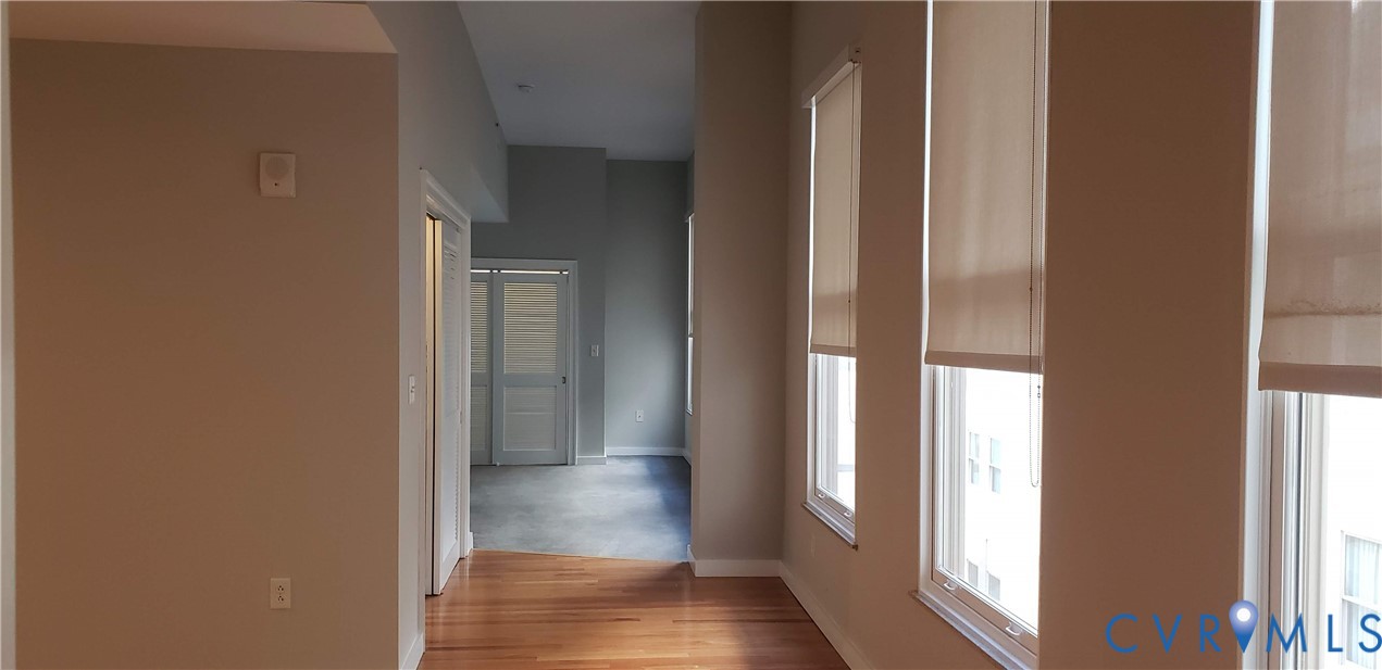 230 North 6th Street, Unit U613 Richmond, VA 23219 - Photo 6 of 10 a view of a hallway with wooden floor