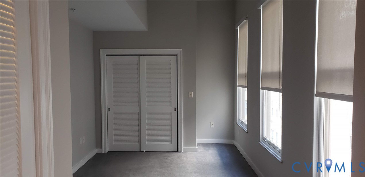 230 North 6th Street, Unit U613 Richmond, VA 23219 - Photo 8 of 10 a view of a hallway with wooden floor