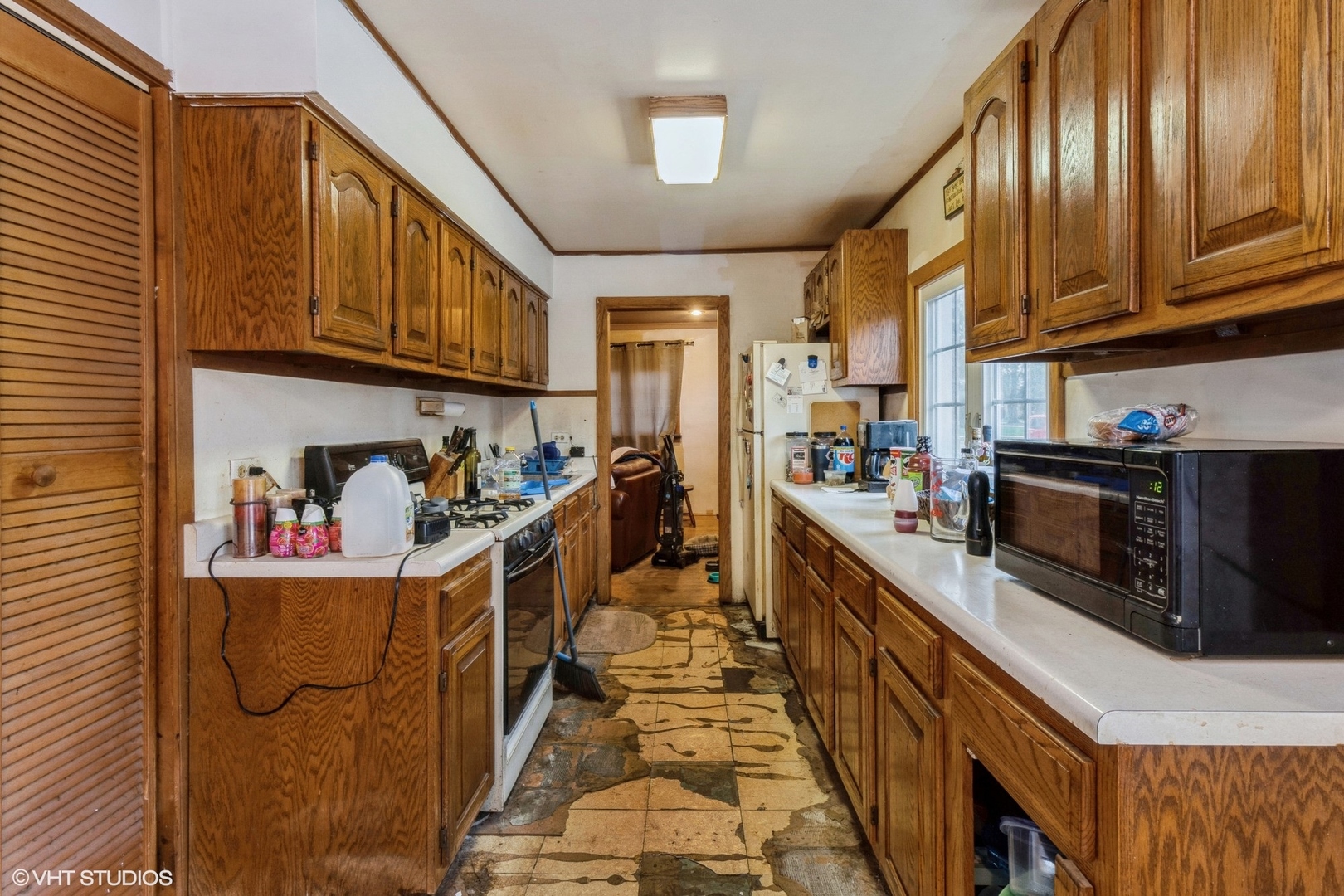 4341 Ruby Street Schiller Park, IL 60176 - Photo 4 of 10 a kitchen with lots of appliances and cabinets