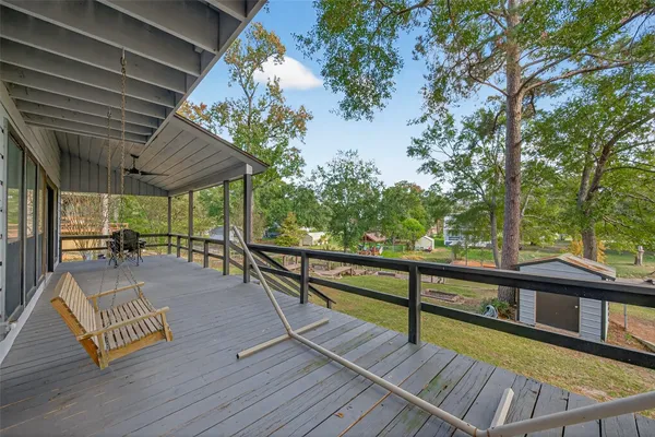 a view of a balcony with chairs