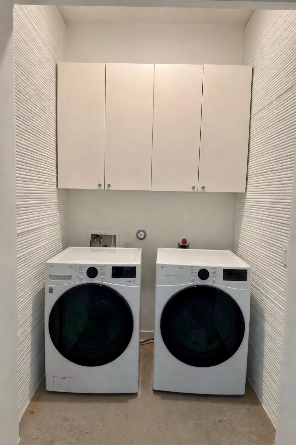 332 Blue Blaze Trail Georgetown, TX 78628 - Photo 13 of 16 Laundry room with cabinet space and independent washer and dryer