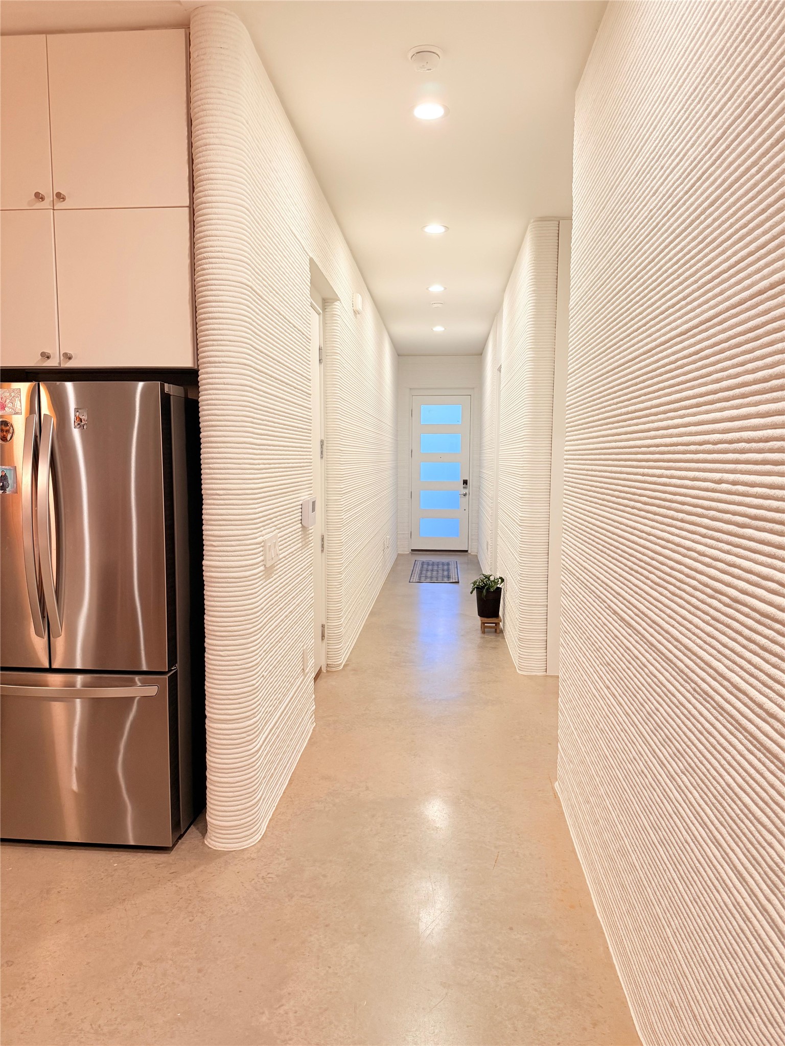 332 Blue Blaze Trail Georgetown, TX 78628 - Photo 3 of 16 Corridor featuring finished concrete flooring and recessed lighting