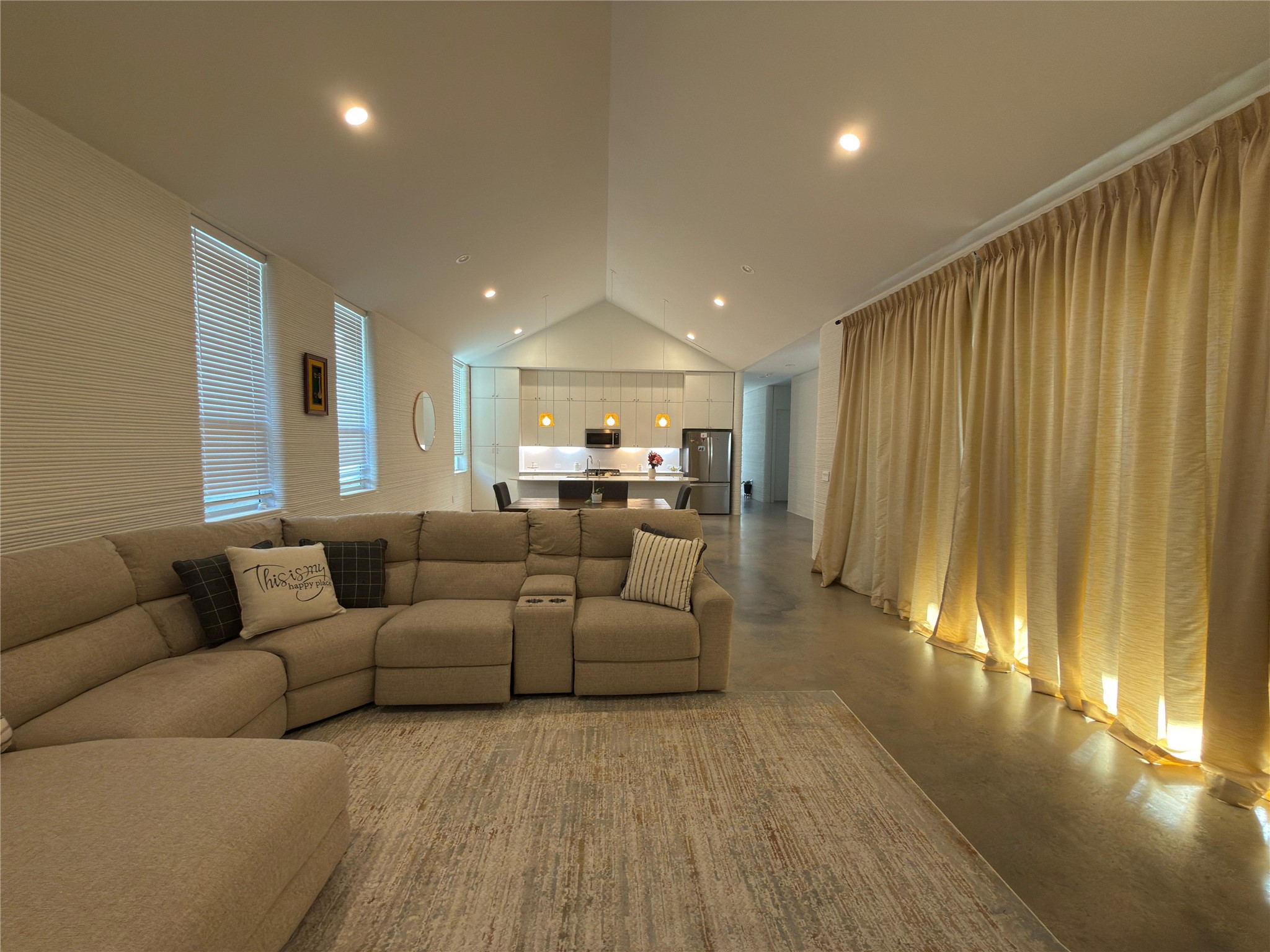 332 Blue Blaze Trail Georgetown, TX 78628 - Photo 6 of 16 Living area featuring finished concrete flooring and recessed lighting