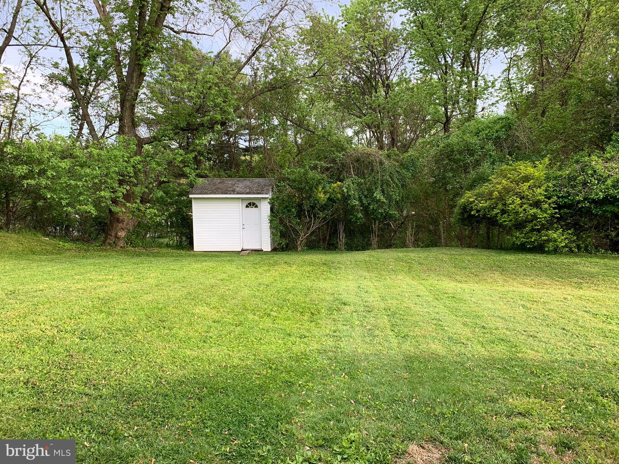 33 Wengate Road Owings Mills, MD 21117 - Photo 16 of 16 Large flat back yard. Backing to woods