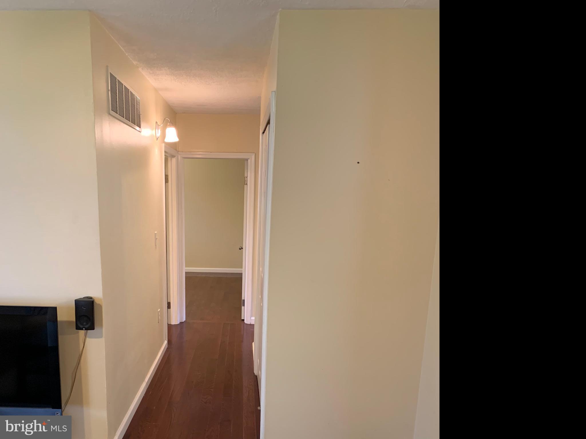 33 Wengate Road Owings Mills, MD 21117 - Photo 8 of 16 Hall way and bed rooms all hardwood.