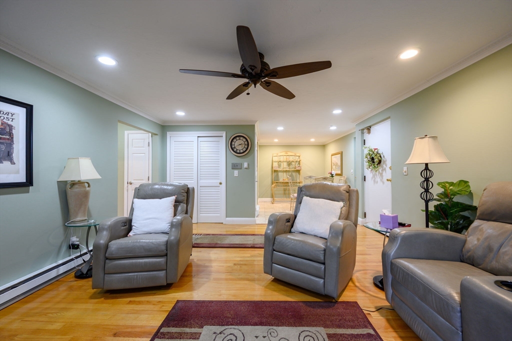 53 Will Drive, Unit 143 Canton, MA 02021 - Photo 7 of 23 a living room with furniture