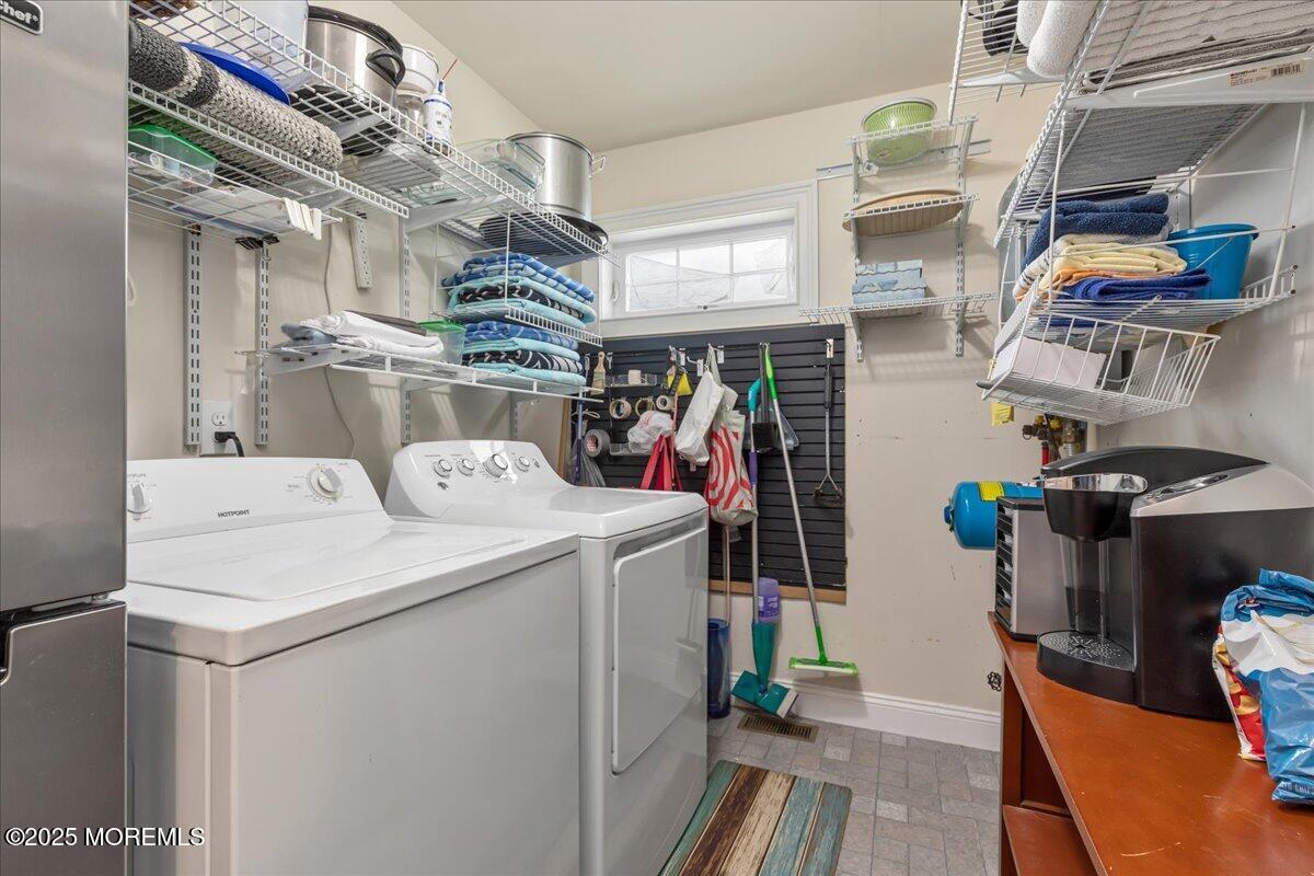 186 Flamingo Road Tuckerton, NJ 08087 - Photo 26 of 55 a utility room with dryer and washer